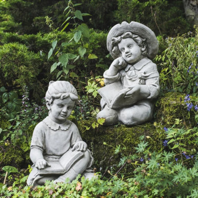 Large Reading Boy And Girl Statues In Sitting Pose from B&Q
