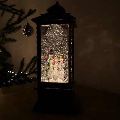 Samuel Alexander 27Cm Premier Glitter Water Spinner Led Lantern Christmas Decoration With Snowman Scene from B&Q
