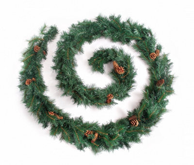 Best Artificial 12Ft Colorado Pine Christmas Garland With Pine Cones Decorated Bannister Staircase Fireplace from B&Q
