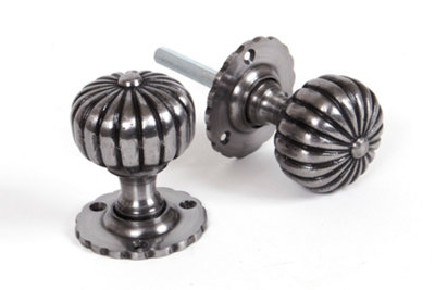 From The Anvil Natural Smooth Flower Mortice Knob Set from B&Q