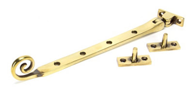 From The Anvil Aged Brass 10 Inch Monkeytail Stay from B&Q