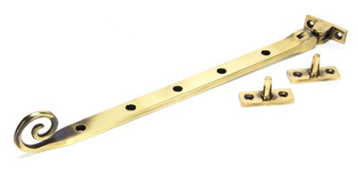 From The Anvil Aged Brass 12 Inch Monkeytail Stay from B&Q