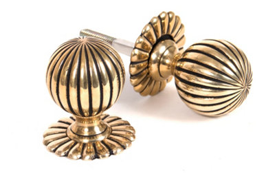 From The Anvil Aged Brass Flower Mortice/rim Knob Set from B&Q