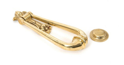 From The Anvil Polished Brass Loop Door Knocker from B&Q