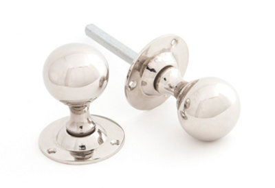 From The Anvil Polished Nickel Ball Mortice Knob Set from B&Q