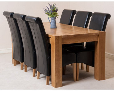 That's Furniture Kuba 180 X 90 Cm Chunky Oak Dining Table And 6 Chairs Dining Set With Montana Black Leather Chairs from B&Q