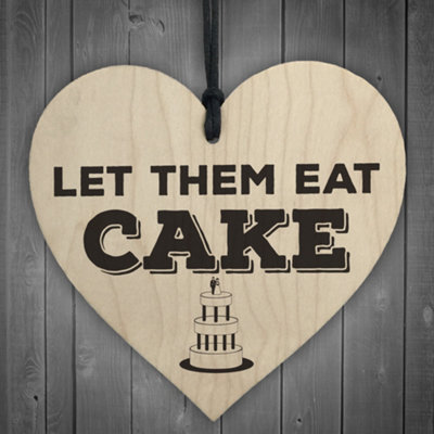 Red Ocean Let Them Eat Cake Novelty Wooden Hanging Heart Plaque from B&Q