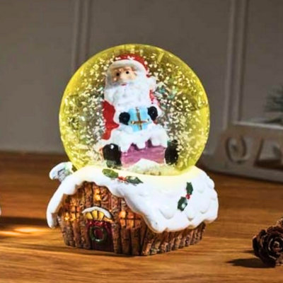 Marco Paul Colour Changing Led Snow Globe With Santa from B&Q