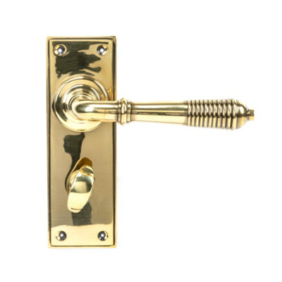 From The Anvil Aged Brass Reeded Lever Bathroom Set from B&Q