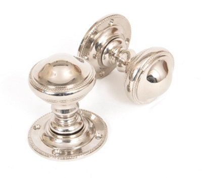 From The Anvil Polished Nickel Brockworth Mortice Knob Set from B&Q