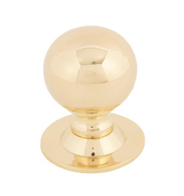 From The Anvil Polished Brass Ball Cabinet Knob 31mm from B&Q