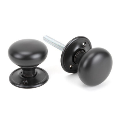 From The Anvil Aged Bronze Mushroom Mortice/rim Knob Set from B&Q