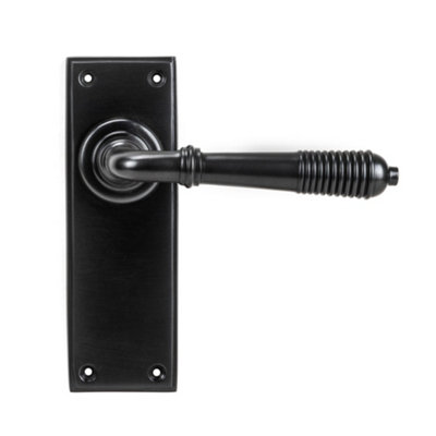 From The Anvil Aged Bronze Reeded Lever Latch Set from B&Q