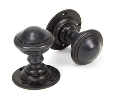 From The Anvil Aged Bronze Brockworth Mortice Knob Set from B&Q