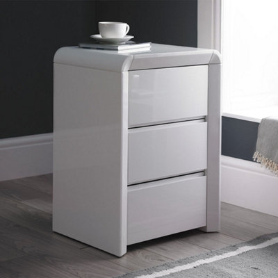 Ice High Gloss 3 Drawer White Bedside Table from B&Q