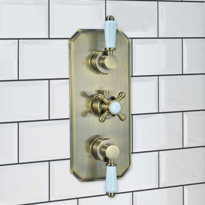 Enki Regent Antique Brass Modern Bathroom Concealed Thermostatic Wall Mounted Crosshead 2-Outlet Triple Valve Shower Mixer Unit from B&Q