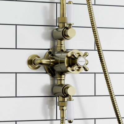 Enki Downton Antique Brass White Traditional Bathroom Ceramic Thermostatic Concentric 2-Outlet Triple Valve Crosshead Shower Mixer from B&Q