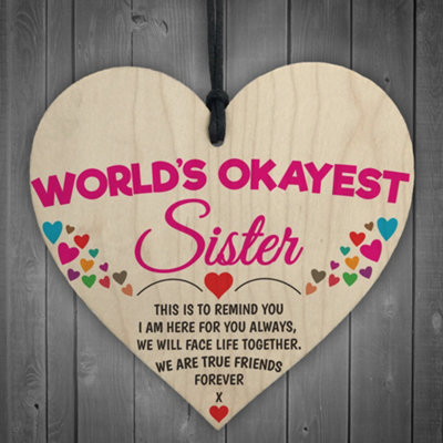 B&Q -  Worlds Okayest Sister Novelty Hanging Heart Plaque Sign Gift