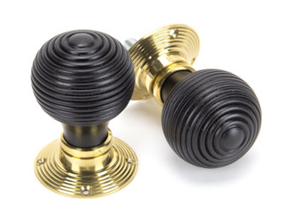 From The Anvil Ebony & Polished Brass Beehive Mortice/rim Knob Set from B&Q