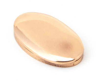 From The Anvil Polished Bronze Oval Escutcheon & Cover from B&Q