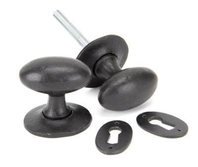 From The Anvil External Beeswax Oval Mortice/rim Knob Set from B&Q