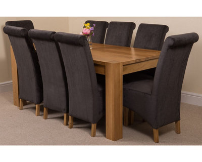 That's Furniture Kuba 180 X 90 Cm Chunky Oak Dining Table And 8 Chairs Dining Set With Montana Black Fabric Chairs from B&Q