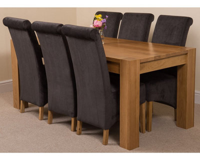 That's Furniture Kuba 180 X 90 Cm Chunky Oak Dining Table And 6 Chairs Dining Set With Montana Black Fabric Chairs from B&Q
