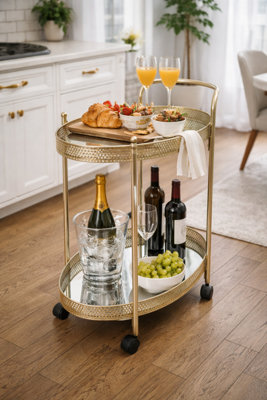 Spot On Dealz Drinks Trolley Gold Kitchen Serving Cart With Two Glass Shelves Mini Bar Drinks Table With Wheels from B&Q