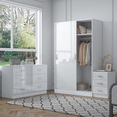 Reflect 2 Door Sliding Wardrobe6 Drawer Wide Chest3 Drawer BedsideWhite Gloss & Matt WhiteModern Bedroom Furniture Set from B&Q