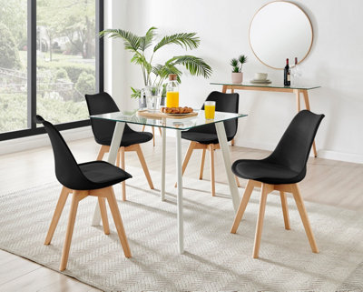Furniturebox Seattle Scandi Inspired Glass And White Leg Square Dining Table & 4 Black Cushioned Stockholm Beech Wood Leg Chairs from B&Q