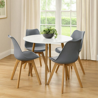 B&Q -  Dining Table Set Of 4 Round White Dining Table And 4 Grey Padded Tulip Chairs