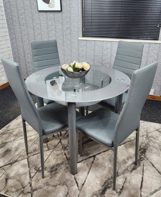 B&Q -  Round Glass Grey Kitchen Dining Table With Storage Shelf And 4 Grey Metal Chairs Set