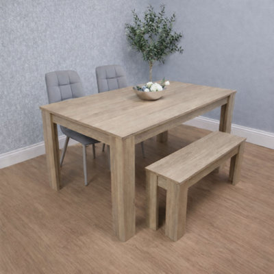 Kosy Koala Dining Table Set Oak Effect Table With 2 Grey Velvet Dining Chairs And 1 Bench from B&Q