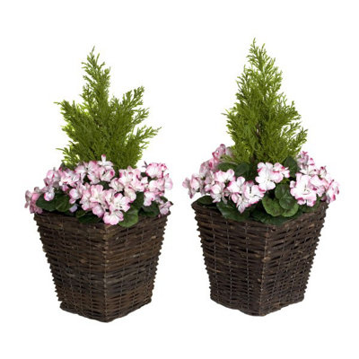 GreenBrokers 2X Artificial Rattan Patio Planters With Pink Geraniums And Cedar Topiary from B&Q