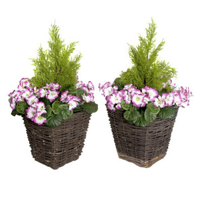 GreenBrokers 2X Artificial Rattan Patio Planters With Purple Geraniums And Cedar Topiary from B&Q