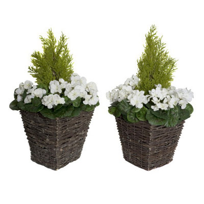GreenBrokers 2X Artificial Rattan Patio Planters With White Geraniums And Cedar Topiary from B&Q