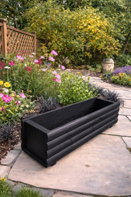 Ruddings Wood Wooden Garden Planter Rectangular Plant Trough Log Design Black (W)90Cm(H)26.5Cm(D)23.5Cm from B&Q