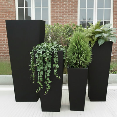 Set Of 4 Idealist Tall Black Reinforced Stone Garden Planters: H38 L18 W18 Cm + H50 L24 W24 Cm + H65 L32 W32 Cm + H89 L43 W43 Cm from B&Q