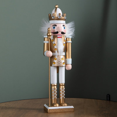 Samuel Alexander 30Cm Wooden Christmas Nutcracker Soldier Decoration With Gold Body And Shoes from B&Q