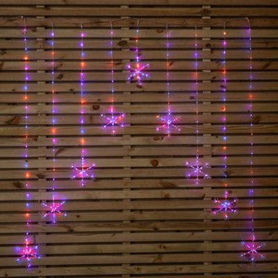 Samuel Alexander 1.2M X 1.2M Light Up Snowflake Pin Wire Christmas Curtain Lights With 339 Rainbow Leds from B&Q