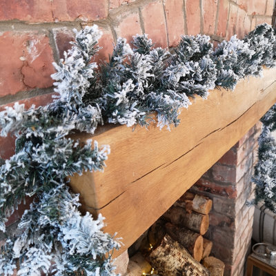 Samuel Alexander 9Ft (2.7M) Premier Christmas Snow Flocked Woodcote Fir Garland from B&Q