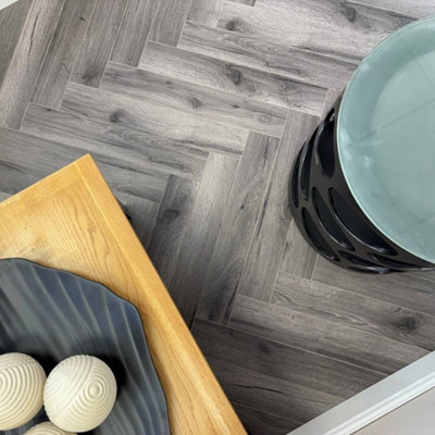 Embrace Herringbone Laminate Flooring Century Oak 12mm from B&Q