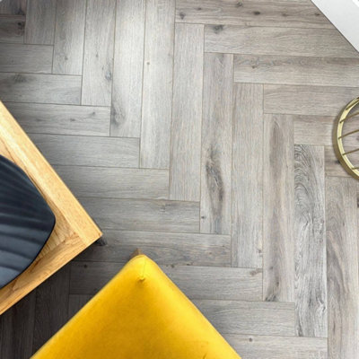 Embrace Herringbone Laminate Flooring Cappuccino Oak 12mm from B&Q