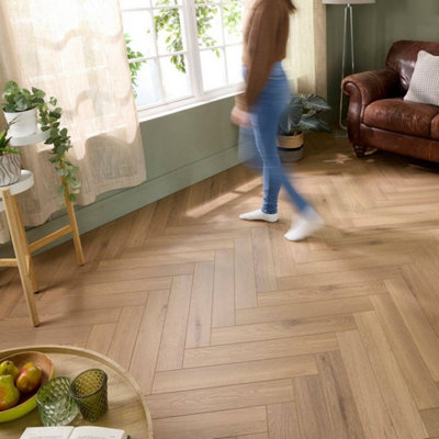 Embrace Herringbone Laminate Flooring Farmhouse Oak 14mm Built-In Underlay from B&Q