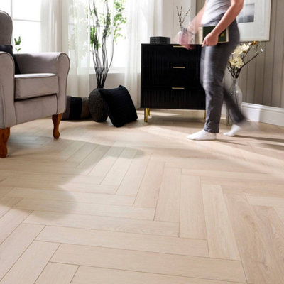 Embrace Herringbone Polar Oak 14mm Laminate Flooring Built-In Underlay from B&Q