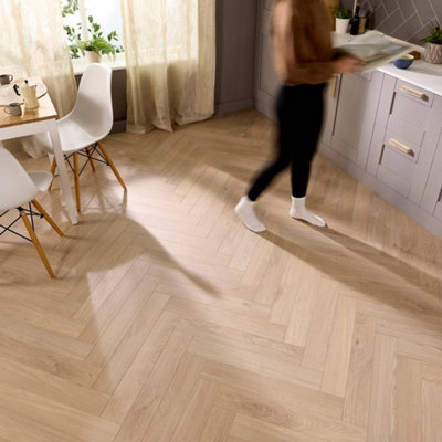 Embrace Herringbone Laminate Flooring Arctic Beige 14mm Built-In Underlay from B&Q