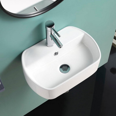 Belofay Counter Top Ceramic Bathroom SinkWhite Elegant And Generous Corner Cloakroom Sink With TapBottle Trap & Pop-Up Waste from B&Q