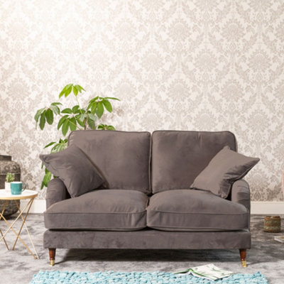 Mackenzie 150Cm Wide Mole Taupe 2 Seat Velvet Fabric Sofa With Brass Coloured Wheel Tipped Walnut Coloured Wooden Legs from B&Q