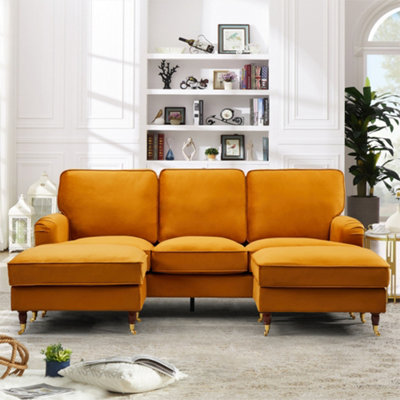 Woodbury 218Cm Wide U-Shaped Orange Velvet Fabric Corner Sofa Walnut Colour Legs With Brass Coloured Wheel from B&Q