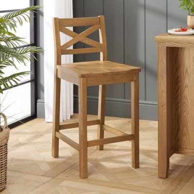 The Furniture Market Cotswold Rustic Oak Cross Back Bar Stool from B&Q